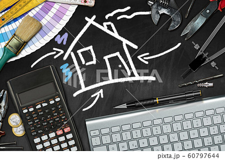 Home Improvement Concept - Work Tools and chalk drawing of a house 60797644