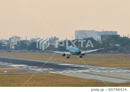 Passenger airplane landing at Saigon Airport Passenger airplane landing at Saigon Airport 60798424