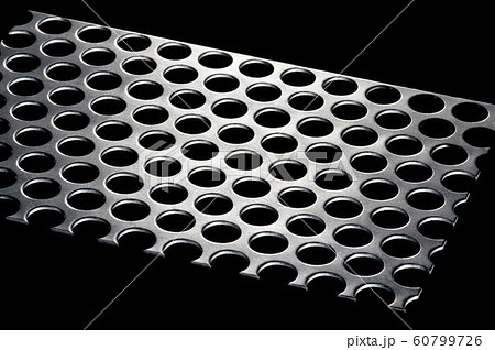 punched metal isolated on black background punched metal isolated on black background 60799726