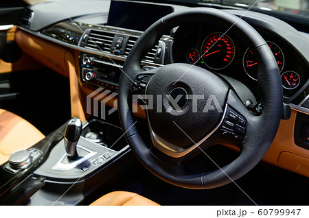 Car interior luxury steering wheel and dashboard 60799947