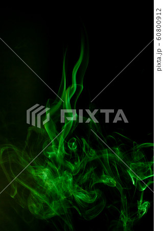 Green smoke motion on black background. 60800912