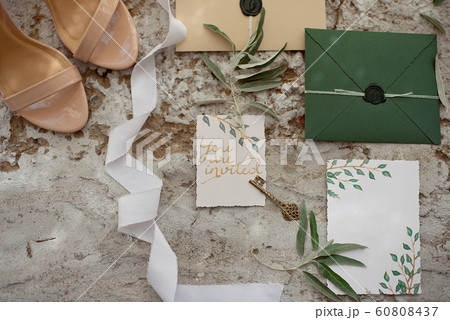 Wedding invitation as a decorated letter in an envelope in the style of boho. Wedding invitation as a decorated letter in an envelope in the style of boho. 60808437