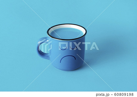 blue mug with a sad face blue mug with a sad face 60809198