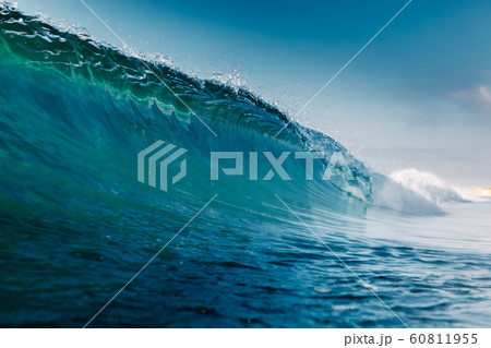 Blue crystal wave in ocean. Breaking wave and sun light 60811955