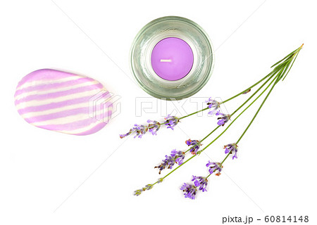 Lavender soap and scented candle isolated on white Lavender soap and scented candle isolated on white 60814148