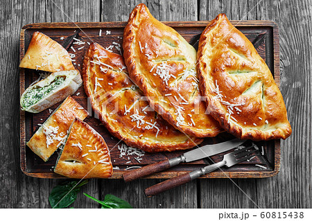 close-up of calzones with Spinach and Cheese close-up of calzones with Spinach and Cheese 60815438