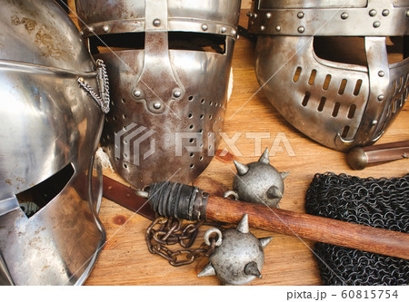 Shiny metal helmets of medieval knights Shiny metal helmets of medieval knights 60815754