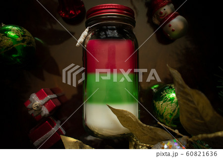 A Flat Lay Photograph of a Christmas Candle 60821636