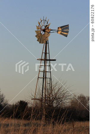 Windmill at Sunset with tree's and Sky. Windmill at Sunset with tree's and Sky. 60822176