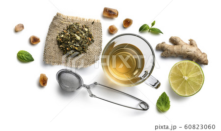 Green tea with natural aromatic additives and accessories. Top view on white background 60823060