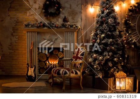 Christmas decoration in cozy house loft, fireplace Christmas decoration in cozy house loft, fireplace 60831319