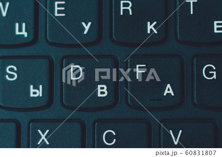 Closeup keyboard and its fragments, white letters Closeup keyboard and its fragments, white letters 60831807