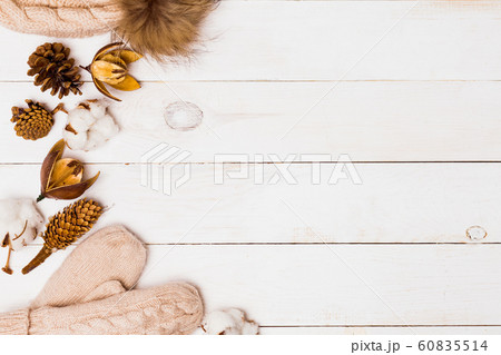 Winter flat lay of warm knitted hats and mittens, 60835514
