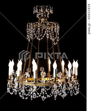 Large crystal chandelier isolated on black background. 60835858