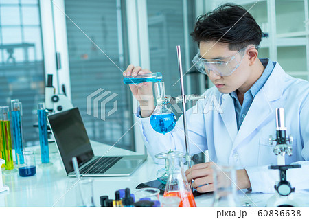 Scientists are experimenting in the lab 60836638