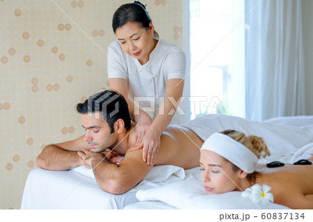 Handsome man enjoy with Thai masseuse massage with girlfriend 60837134