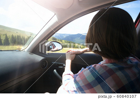 girl traveling in a car 60840107