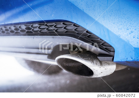 combustion fumes coming out of car exhaust pipe combustion fumes coming out of car exhaust pipe 60842072