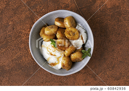 icecream and fried bananas 60842936