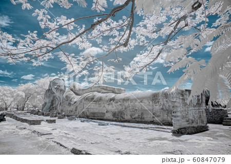 Ancient reclining Buddha Image in infrared Ancient reclining Buddha Image in infrared 60847079