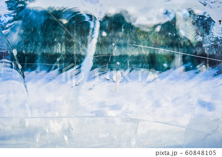 Blue ice surface with scratches. Abstract background of ice structure Blue ice surface with scratches. Abstract background of ice structure 60848105