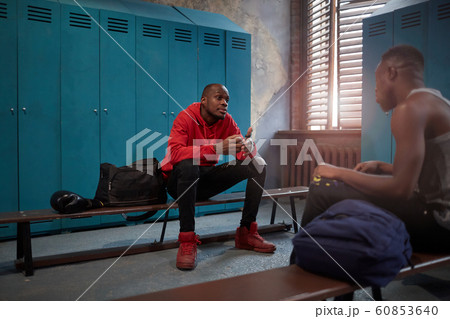 Sportsmen resting after training Sportsmen resting after training 60853640