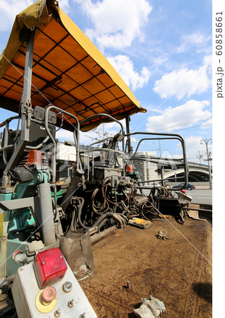 Machine for repair of roads in the modern city Machine for repair of roads in the modern city 60858661