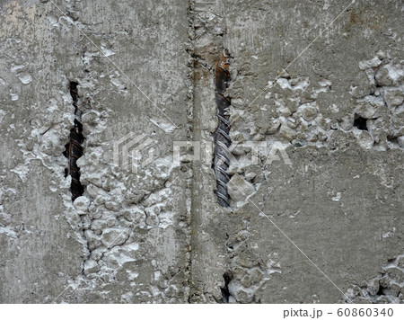 New fresh concrete surface with honeycomb problem and exposing reinforcement bar inside. The problem weakens the concrete strength. . New fresh concrete surface with honeycomb problem and exposing reinforcement bar inside. The problem weakens the concrete strength. . 60860340