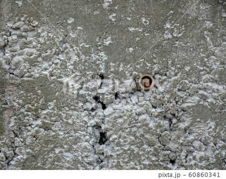 New fresh concrete surface with honeycomb problem and exposing reinforcement bar inside. The problem weakens the concrete strength. . New fresh concrete surface with honeycomb problem and exposing reinforcement bar inside. The problem weakens the concrete strength. . 60860341