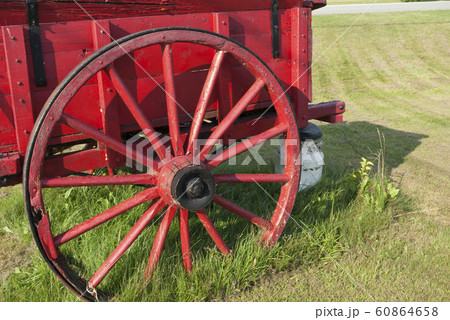 red retro wood calash wheel on grass red retro wood calash wheel on grass 60864658