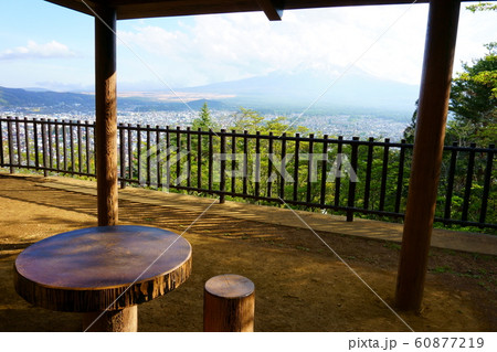 Hillside gazebo overlooking Fuji Yoshida City, with Mount Fuji itself visible in the distance 60877219