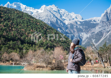 Young woman traveler traveling at Blue Moon Young woman traveler traveling at Blue Moon 60877285