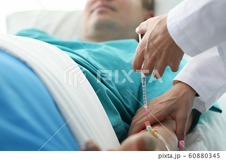 Sick man taking medicament 60880345