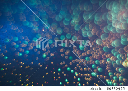 Beautiful bokeh on a sea blue background. Beautiful bokeh on a sea blue background. 60880996