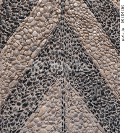 Path with an ancient pattern of pebbles. Texture Path with an ancient pattern of pebbles. Texture 60884869