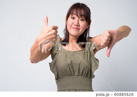 Portrait of beautiful Asian woman against white background 60885626