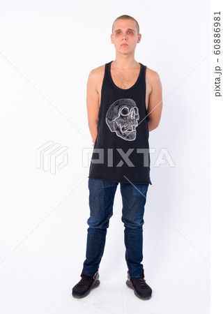Full body shot of young bald rebellious man 60886981