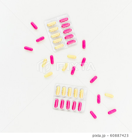 Medical concept with pills of vitamins on white background. Flat lay, top view. 60887423