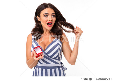 Beautiful caucasian woman is wondered and acceps marriage proposal, picture isolated on white 60888541