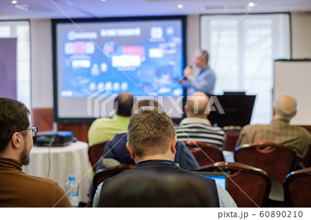Audience listens lecturer at workshop 60890210