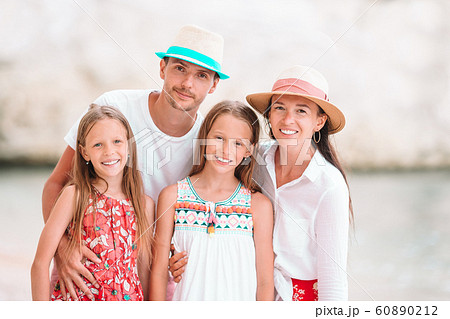 Young family on vacation have a lot of fun Young family on vacation have a lot of fun 60890212