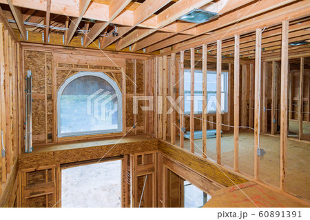 Framing beam of new house under construction home 60891391
