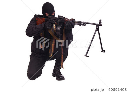 mercenary in black uniform with machine gun and mercenary in black uniform with machine gun and 60891408