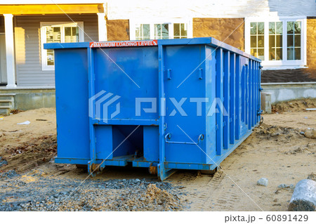Recycling container trash dumpsters being full 60891429