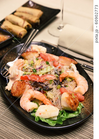 Spicy seafood with glass noodle salad 60902773