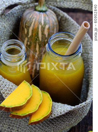 butternut squash milk bottle, yellow healthy, nutritious drink for breakfast  60902840