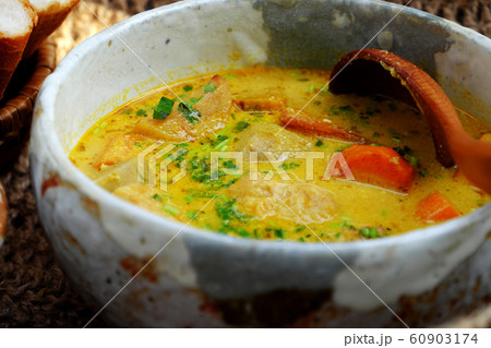 Delicious yellow vegan curry dish bowl with bread for breakfast, homemade Vietnamese food 60903174