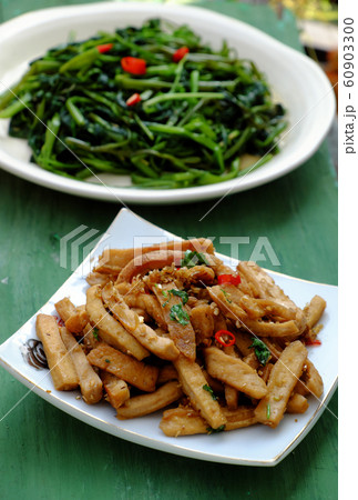 simple vegan meal for daily family menu with fried tofu cook with sauce, fried water spinach simple vegan meal for daily family menu with fried tofu cook with sauce, fried water spinach 60903300