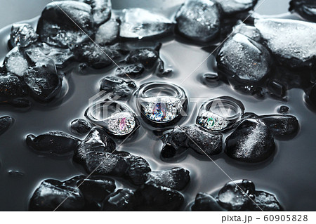 Transparent icy rings made from glass in ice and Transparent icy rings made from glass in ice and 60905828