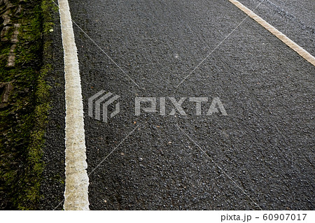 New asphalt texture with white line on road 60907017